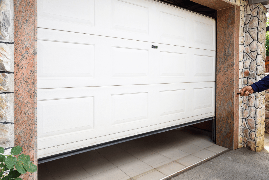 Garage door partially opening due to broken spring